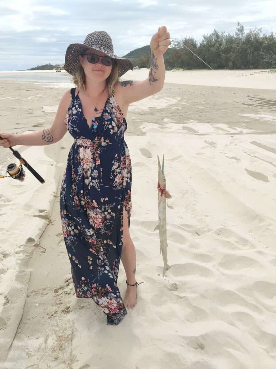 woman on Moreton Island fishing