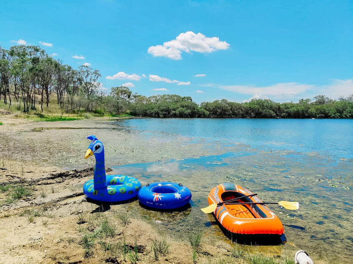 inflatables and kayak near water at glendon camping