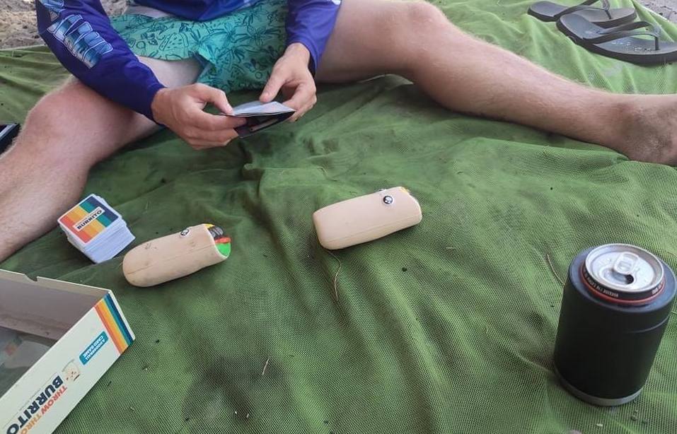 Playing throw throw burrito while camping