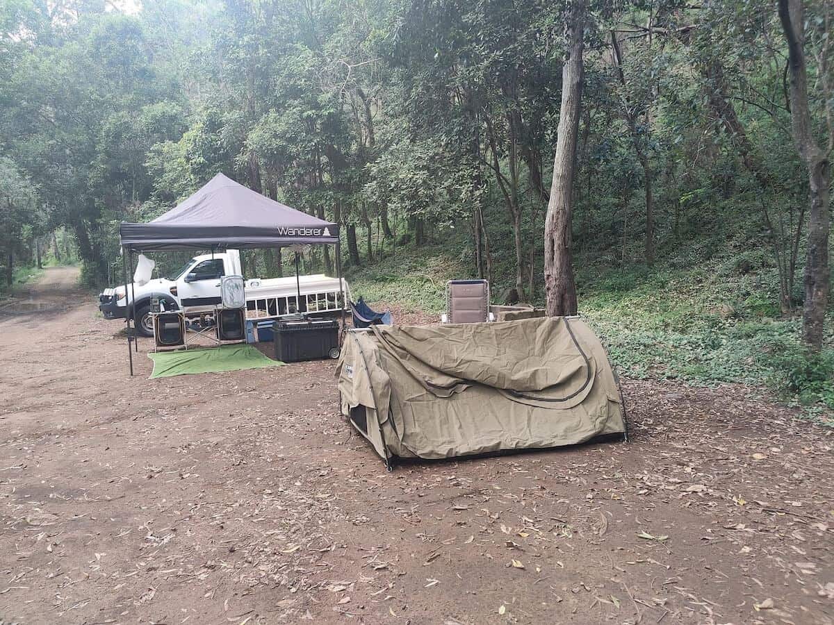 campsite with a swag, ute and gazebo