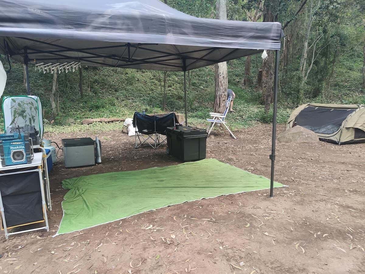 camping set up with swag and gazebo