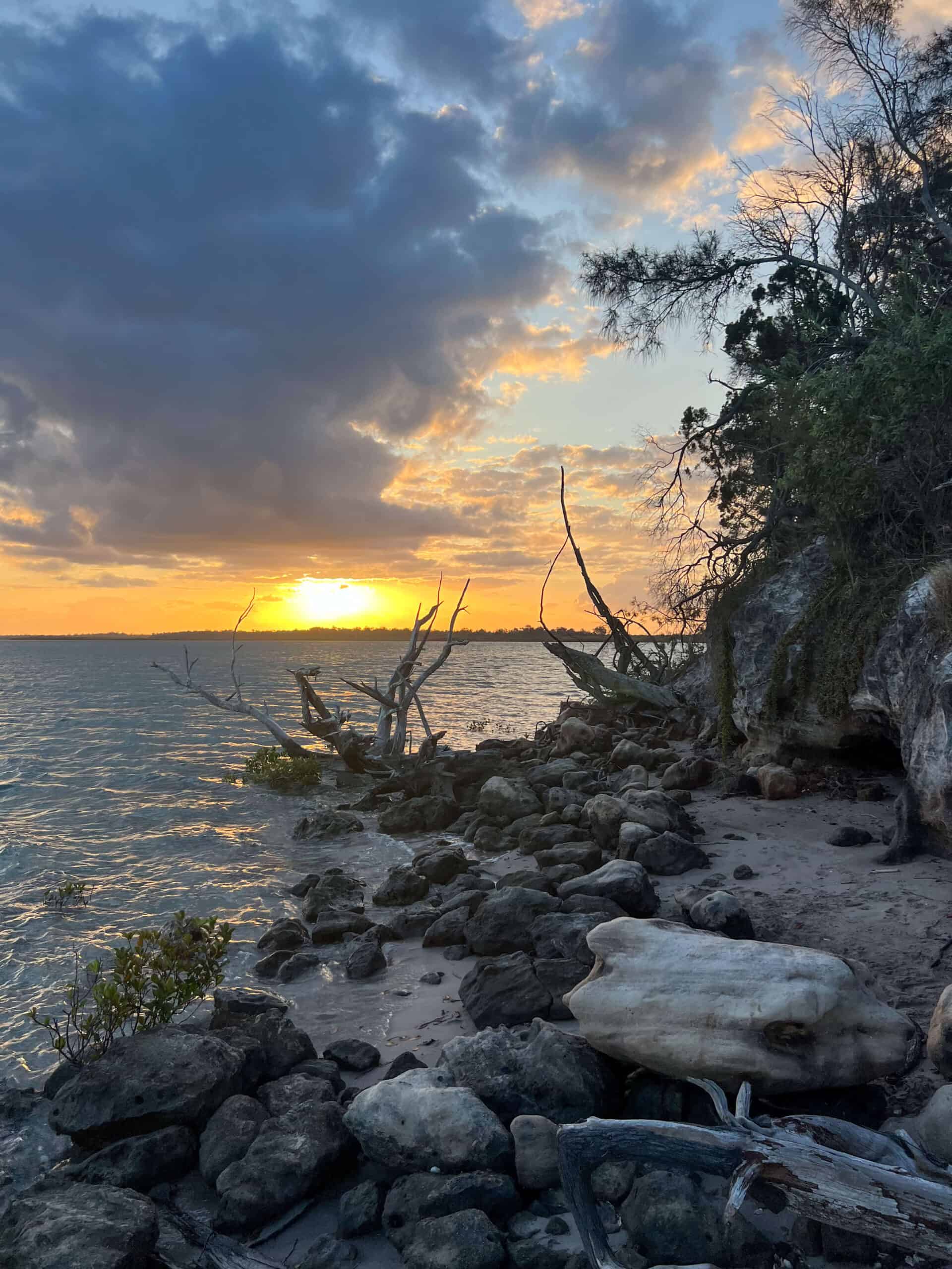 sunset over ocean in woodgate queensland.